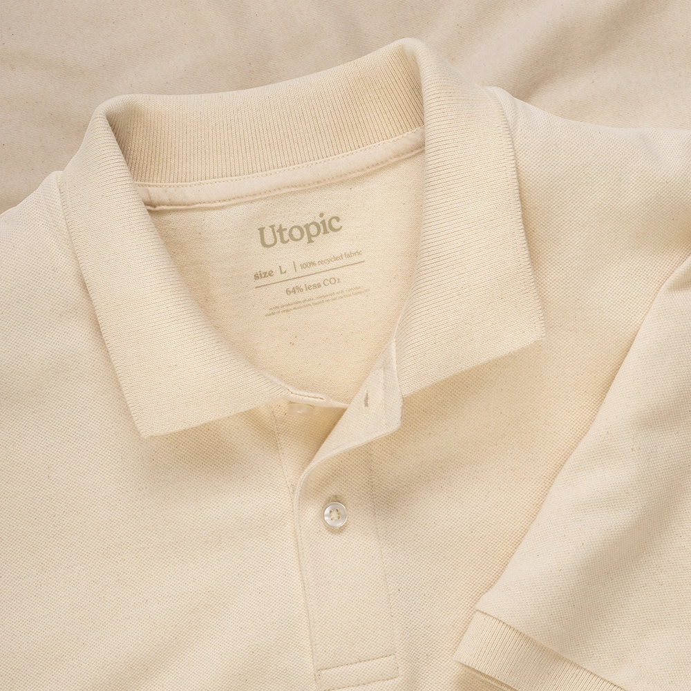 Immagine Polo unisex in cotone e poliestere rigenerati da 200 g/m2